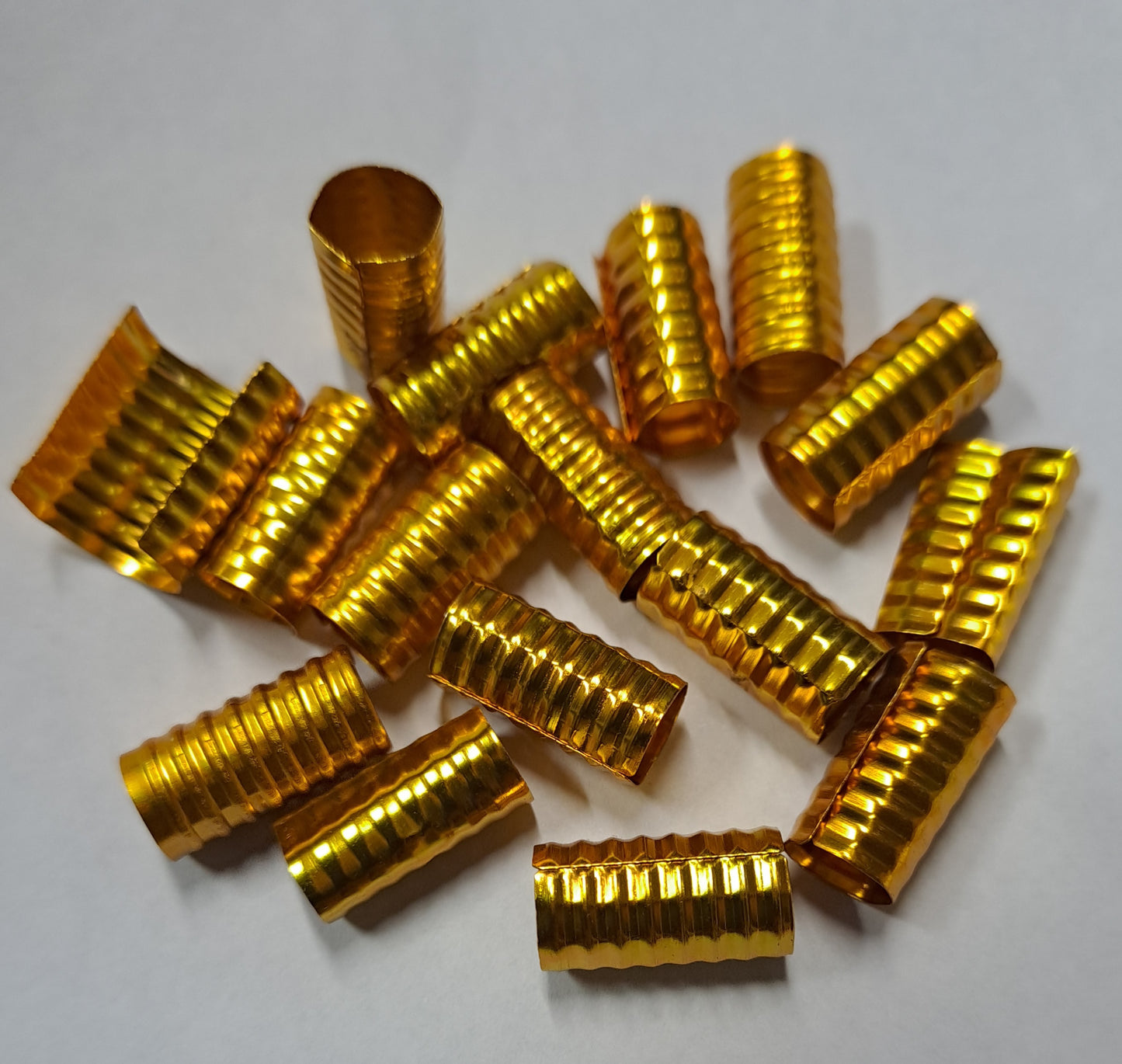 Anelli classici lunghi per capelli regolabili. 20 pz colore oro giallo.